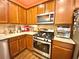 Contemporary kitchen with stainless steel appliances, including a gas range and built-in microwave at 3534 Clancy Way, Smyrna, GA 30080