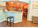 Open concept kitchen area featuring granite countertops and a breakfast bar with seating at 3534 Clancy Way, Smyrna, GA 30080