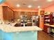 Well-equipped kitchen boasts stainless steel appliances, granite counters, and ample cabinet space at 3534 Clancy Way, Smyrna, GA 30080