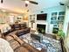 Spacious living room with hardwood floors, built-in shelves and a cozy fireplace at 3534 Clancy Way, Smyrna, GA 30080