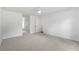 Bright bedroom featuring neutral walls, plush carpet, and a modern ceiling fan at 4042 Laurel Bend Ct, Snellville, GA 30039