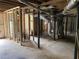 Unfinished basement featuring a water heater and exposed ductwork, ready for customization at 410 S Gordon Sw Rd, Mableton, GA 30126