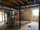 Unfinished basement with visible ductwork and utilities, providing a blank canvas for renovation at 410 S Gordon Sw Rd, Mableton, GA 30126