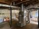 An unfinished basement shows ductwork and support beams ready for customization at 410 S Gordon Sw Rd, Mableton, GA 30126