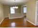 Hardwood floored dining area with natural light and an open layout at 410 S Gordon Sw Rd, Mableton, GA 30126