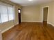 Bright living room with hardwood floors and large window at 410 S Gordon Sw Rd, Mableton, GA 30126