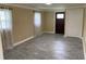 Comfortable living room with two windows letting in natural light and tile floors at 410 S Gordon Sw Rd, Mableton, GA 30126