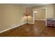 Inviting living room featuring hardwood floors, ample space, and warm, neutral paint colors at 410 S Gordon Sw Rd, Mableton, GA 30126