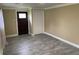 Comfortable living room with a door to outside and a closet at 410 S Gordon Sw Rd, Mableton, GA 30126