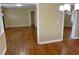 Hardwood floored living area with natural light and an open layout at 410 S Gordon Sw Rd, Mableton, GA 30126