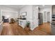 Open living space with hardwood floors, stainless steel appliances and ample room for seating at 10880 Windham Way, Alpharetta, GA 30022