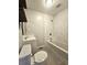 Updated bathroom features a tub and shower combination, a white vanity and a tile floor at 1341 Se Joyner Se Ave, Marietta, GA 30060