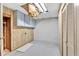 Unfinished basement area featuring wood paneling and a closet for storage space at 620 Amberidge Trl, Atlanta, GA 30328