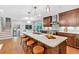 Bright, open kitchen with a large island, bar seating, and stainless steel appliances at 620 Amberidge Trl, Atlanta, GA 30328