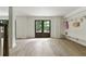 Finished basement with stylish floors, convenient mudroom features, and walkout double doors at 2973 Payton Ne Rd, Atlanta, GA 30345