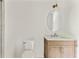 Bright, renovated bathroom with vanity and marble top, classic tiles, and neutral paint at 2973 Payton Ne Rd, Atlanta, GA 30345
