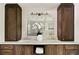 Elegant bathroom featuring a double sink vanity with dark wood cabinets and a stylish mirror at 2973 Payton Ne Rd, Atlanta, GA 30345