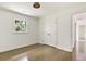 Bedroom with hardwood floors, a window, closet and neutral paint at 2973 Payton Ne Rd, Atlanta, GA 30345