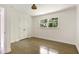 Bright bedroom with hardwood floors, a window, and closet at 2973 Payton Ne Rd, Atlanta, GA 30345