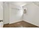 Walk in closet featuring hardwood floors, a window, and built in wire shelving at 2973 Payton Ne Rd, Atlanta, GA 30345