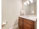 Bathroom featuring a vanity with storage and well lit mirror at 326 Roswell Se St # 406, Marietta, GA 30060