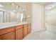 Bright bathroom features double vanity, modern fixtures, and access to the walk-in closet at 326 Roswell Se St # 406, Marietta, GA 30060