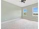 Inviting bedroom with dual windows and a ceiling fan provides ample natural light at 326 Roswell Se St # 406, Marietta, GA 30060