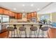 Modern kitchen featuring an island with bar stool seating, stainless steel appliances, and hardwood floors at 326 Roswell Se St # 406, Marietta, GA 30060