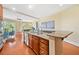 Spacious kitchen features an island with granite countertops, stainless steel appliances, and hardwood floors at 326 Roswell Se St # 406, Marietta, GA 30060