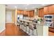 Kitchen with stainless steel appliances, granite countertops, eat-in counter and wood cabinets at 326 Roswell Se St # 406, Marietta, GA 30060