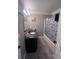 This bathroom offers a sink and shower with blue patterned shower curtain at 3560 Elinburg Dr, Buford, GA 30519