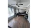 A versatile bedroom featuring a ceiling fan, desk, and a spacious layout at 3560 Elinburg Dr, Buford, GA 30519