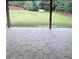 Patio featuring a textured concrete pad and a view of the backyard at 3560 Elinburg Dr, Buford, GA 30519
