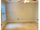 Bedroom featuring neutral walls, carpet flooring, and a window at 795 Abbotts Mill Ct # 73, Johns Creek, GA 30097