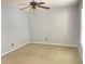 Bedroom with beige carpet, neutral walls, and ceiling fan with lights at 795 Abbotts Mill Ct # 73, Johns Creek, GA 30097