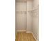A walk-in closet with white wire shelving and neutral carpet at 795 Abbotts Mill Ct # 73, Johns Creek, GA 30097