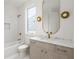 Stylish bathroom features a modern vanity, updated fixtures, and a well-lit mirror and bathtub at 11560 Serenbe Ln, Chattahoochee Hills, GA 30268