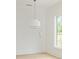 Bright bedroom with hardwood floors and recessed lighting at 11560 Serenbe Ln, Chattahoochee Hills, GA 30268