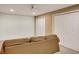 Finished basement featuring a large sofa, and multiple closets at 3245 Bywater Trl, Roswell, GA 30075