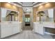 Bathroom with double vanities, granite countertops, tile floors, and decorative mirrors at 3245 Bywater Trl, Roswell, GA 30075