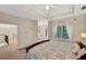 Carpeted bedroom featuring neutral walls, natural lighting, and hallway views at 3245 Bywater Trl, Roswell, GA 30075