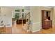 Elegant foyer with hardwood floors, staircase, and views into the formal living area at 3245 Bywater Trl, Roswell, GA 30075