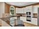 Modern kitchen with stainless steel appliances and granite countertops at 3245 Bywater Trl, Roswell, GA 30075