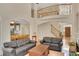 Bright and spacious living room featuring stairs, front door, and eat-in kitchen views at 3245 Bywater Trl, Roswell, GA 30075