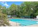 Resort style community pool with lap lanes and lounge chairs for relaxing at 3245 Bywater Trl, Roswell, GA 30075