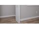Bedroom featuring wood-look flooring and white trim at 325 Berry Ct, Villa Rica, GA 30180