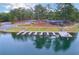 Waterfront view of docks and a lakeside bar & grill, promising leisure and relaxation at 325 Berry Ct, Villa Rica, GA 30180