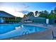 Inviting pool area with lounge chairs and clubhouse, perfect for relaxation and socializing at 325 Berry Ct, Villa Rica, GA 30180