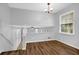 The living room has new hardwood floors, fresh paint, and bright windows at 4246 Rue Saint Michel, Stone Mountain, GA 30083