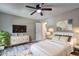 Inviting bedroom with a bright window, modern dresser, and plush bedding for a relaxing retreat at 2685 Peachtree Walk Walk, Duluth, GA 30096
